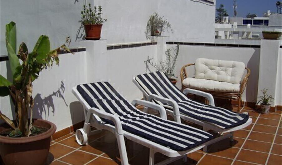 Apartamentos El Barrio